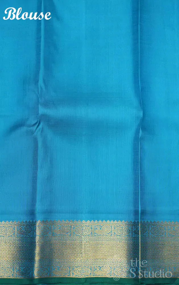 Pista green kanchi silk saree with korvai anandha blue border