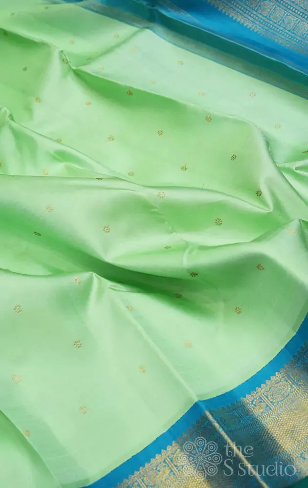 Pista green kanchi silk saree with korvai anandha blue border