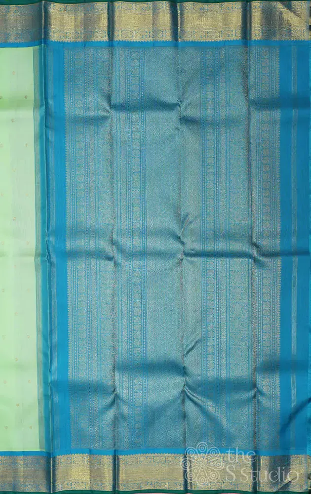Pista green kanchi silk saree with korvai anandha blue border